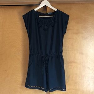 Black romper with cutout details